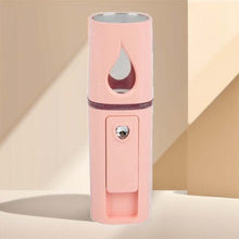 Load image into Gallery viewer, Compact Nano Mist Sprayer with USB charger for moisturizing and refreshing skin on the go