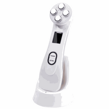 Load image into Gallery viewer, Femvy LED Glow Wand handheld light therapy device with charging base and control buttons.