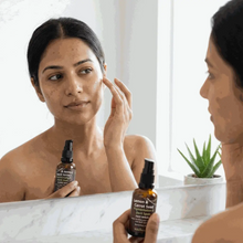 Load image into Gallery viewer, Bottle of VLEssentials Vitamin C Serum with lemon and carrot seed for brightening pigmentation and dark spots
